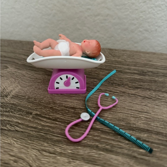 My Mini Baby Series 2 Red Hair baby and purple Scale - Picture 1 of 2